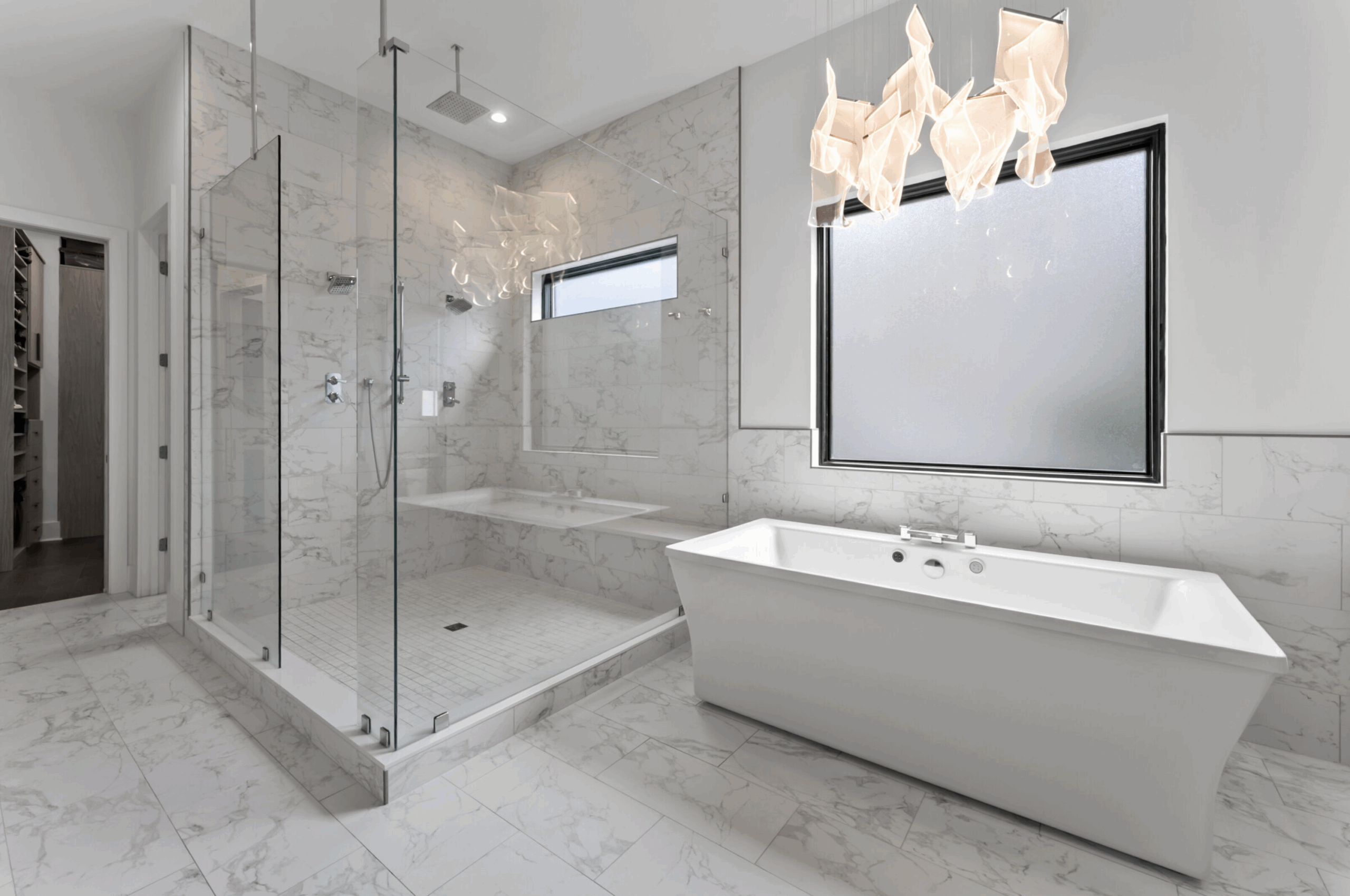 Luxury all white bathroom with chandelier